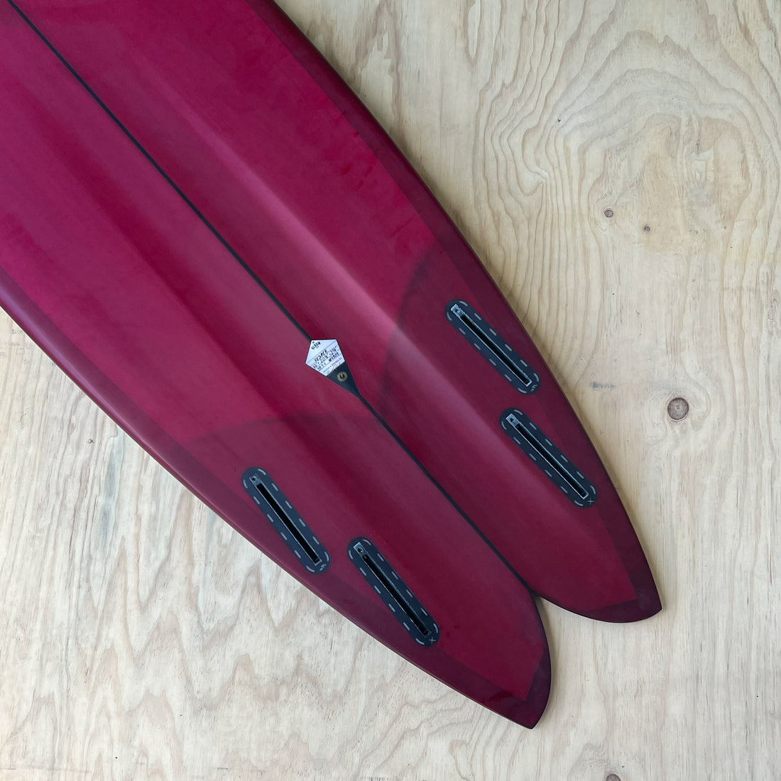 Album Surfboards close in view of the unique quad and channel design feature.