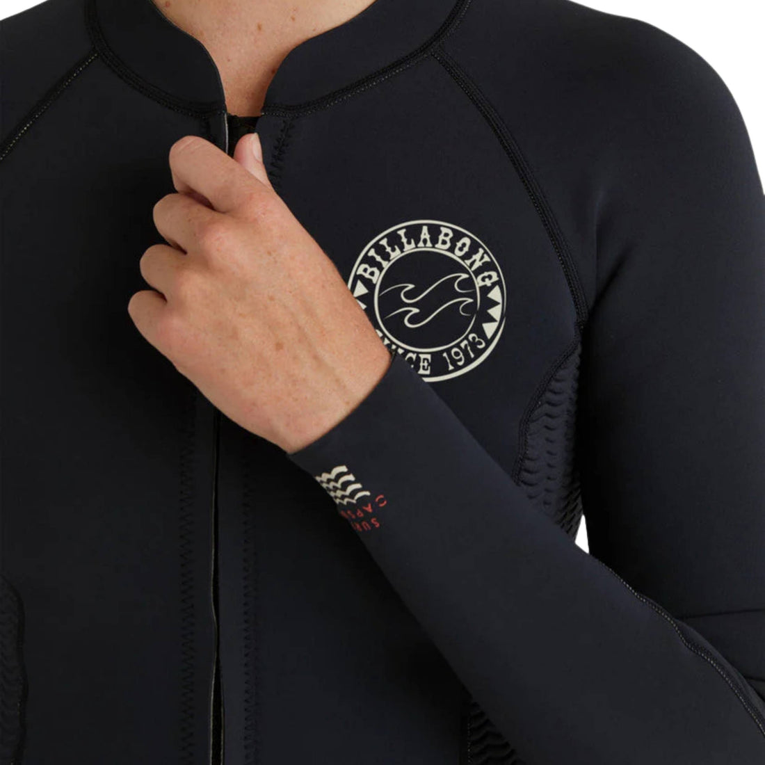 Close-up of chest zip entry on Billabong Peeky Natural 1mm Jacket