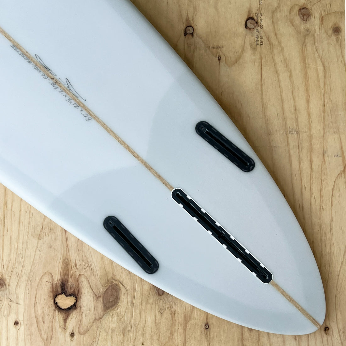 Christenson C-Bucket surfboard – midlength single-fin pintail with redwood stringer single fin plus side bites clear tint at Freeride Surf Skate NZ