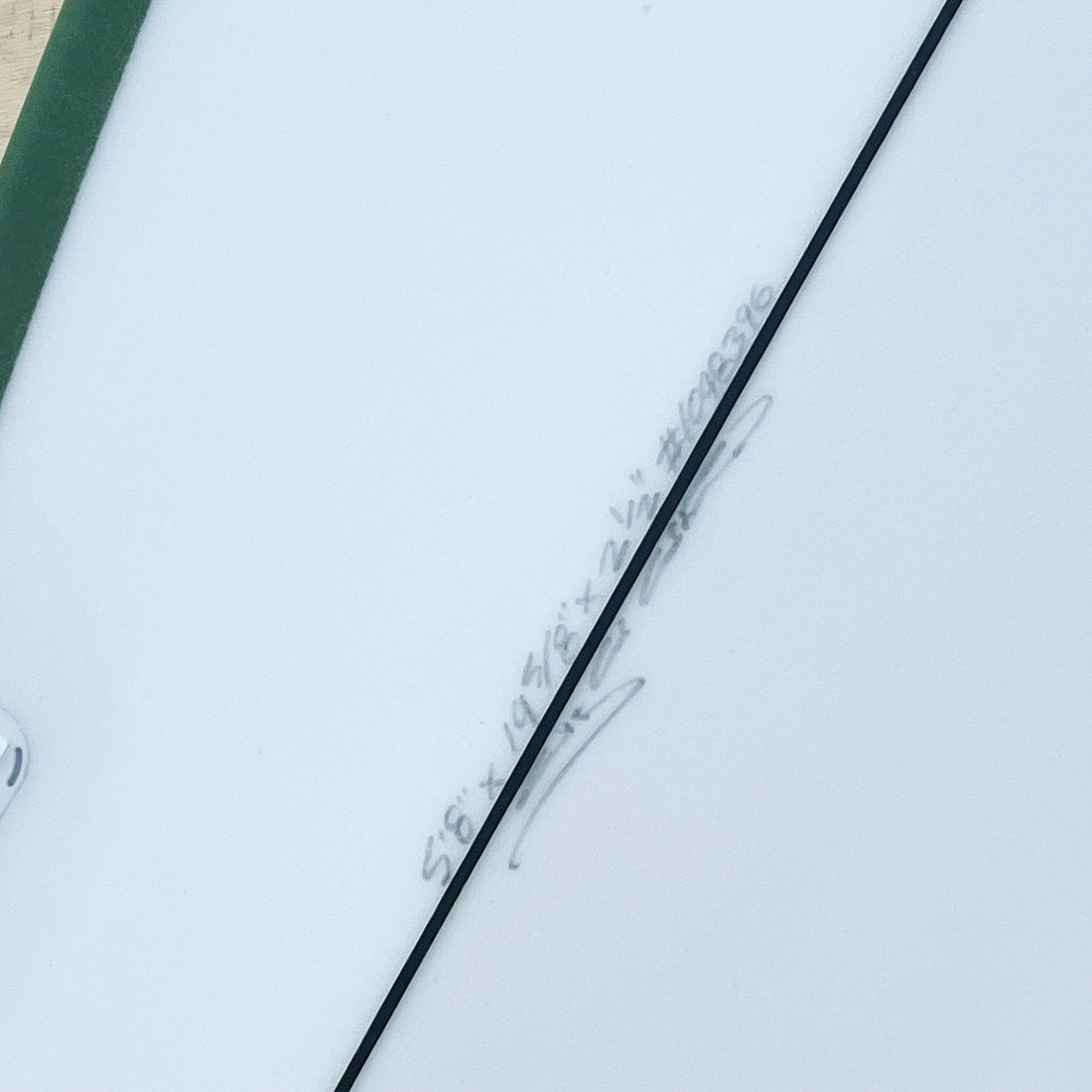 Christenson Lane Splitter surfboard with a squash tail design, featuring a white board and Green Rail Spray 2+1 Futures set up. Shop Christenson Surfboards at Freeride Surf & Skate NZ