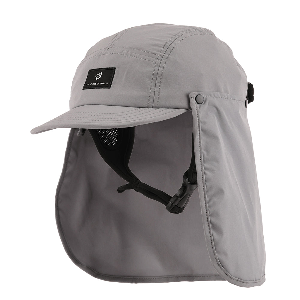 Creatures Reliance Legionnaire Surf Cap in Titanium with detachable neck flap and adjustable neoprene chin strap.