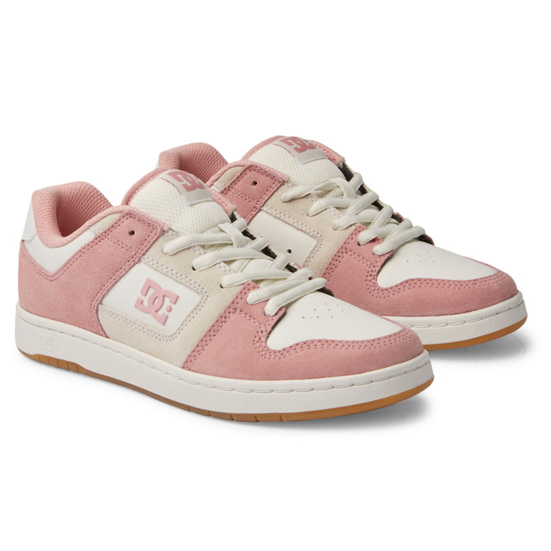 A pair of women's DC Manteca 4 Blush sneakers with a pink, white, and black color scheme.