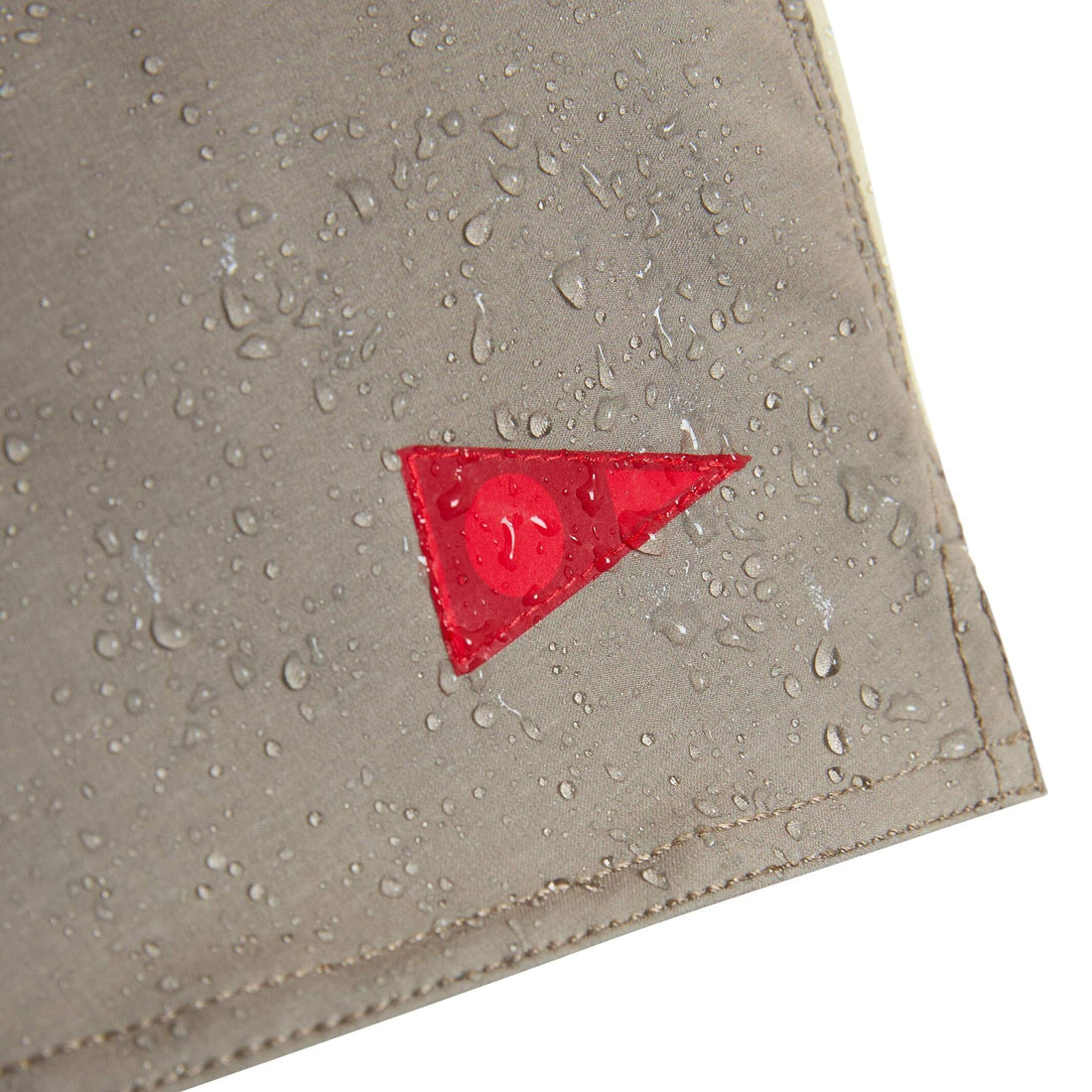 Close-up of Florence F1 Airtex Gamma Boardshort in Taupe recycled polyester stretch fabric with C0 DWR coating, NZ.