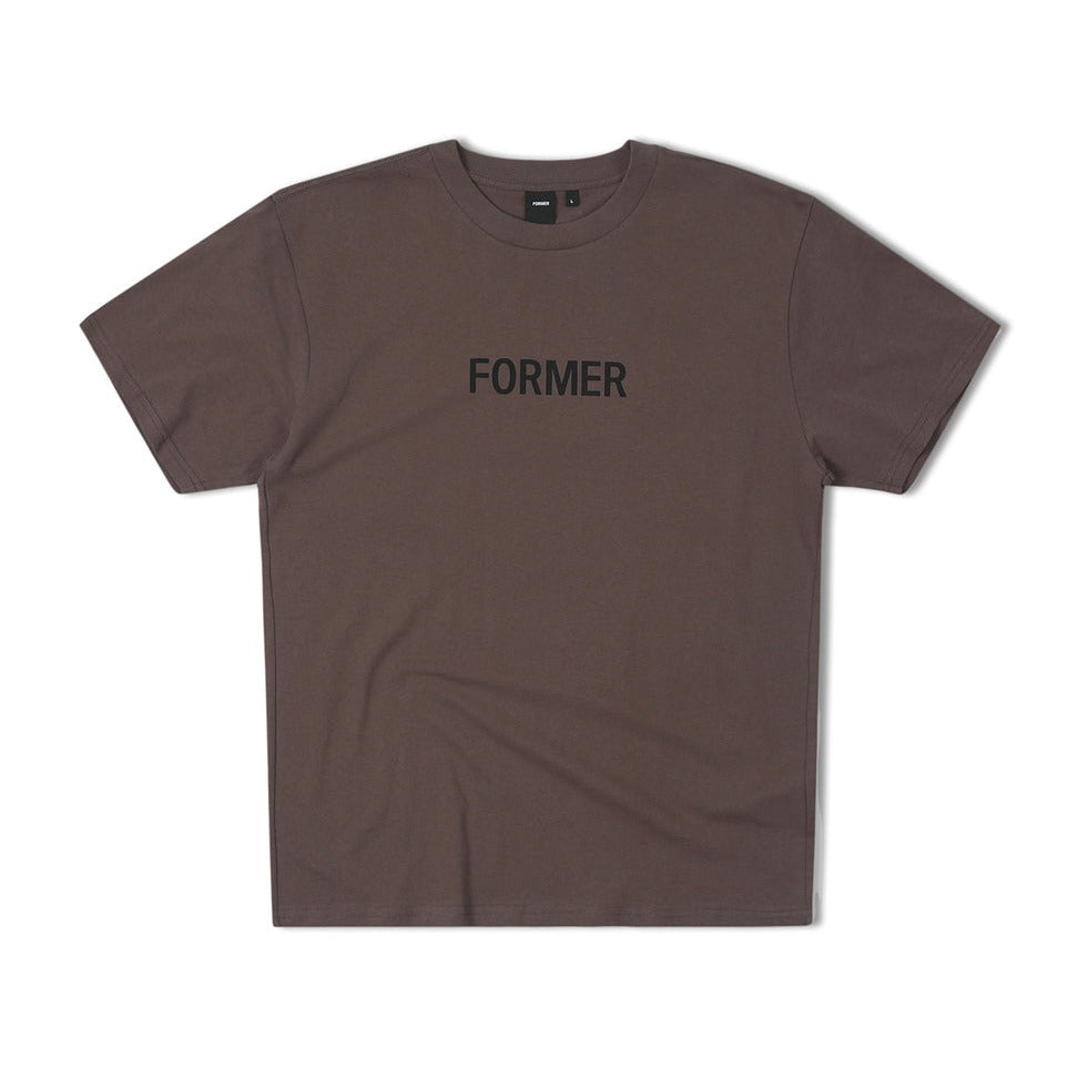 Former Legacy T-Shirt in Tarmac available at Freeride Surf & Skate NZ.
A brown t-shirt with the text 'FORMER' printed in black on the front.