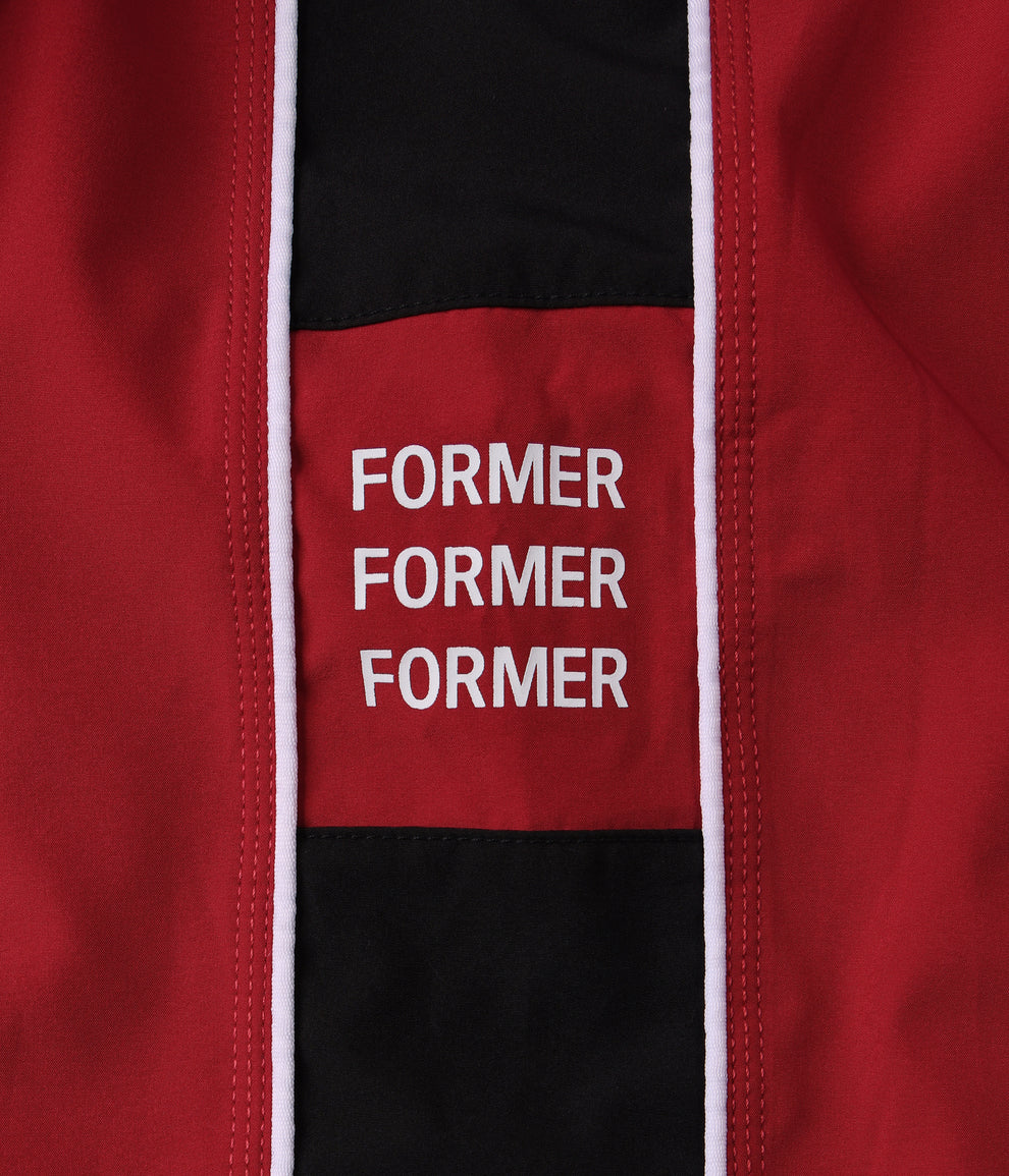 Former System Eclipse 20" Trunk Red — 4-way stretch red surf boardshorts with drawcord waist and Velcro pocket, available at Freeride Surf & Skate NZ.