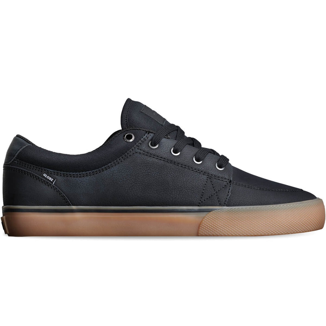 A low-top men's skate shoe with a black upper, vegan-friendly synthetic leather and canvas construction, and a gum-colored sole.