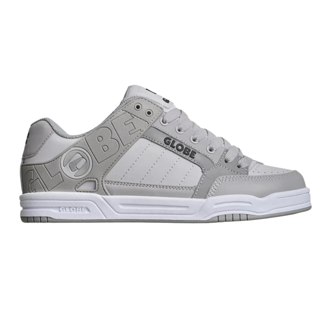 Side profile of Globe Tilt Triple Grey skate shoes featuring tonal grey panels and Globe branding