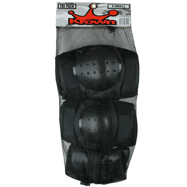 A set of black protective gear for skateboarding, including elbow pads, knee pads, and wrist guards, packaged in a mesh bag with the KROWN logo on the label. Krown protection set with knee pads elbow pads and wrist guards available at Freeride Surf & Skate NZ.