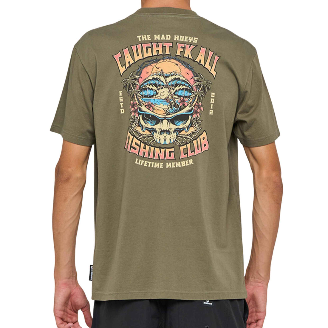Mad Hueys Caught FK All Skull Tee Olive — olive skate/surf tee with large skull artwork, available at Freeride Surf & Skate NZ.