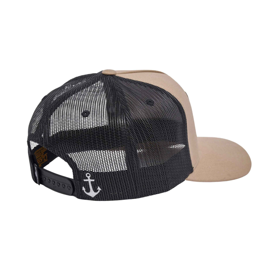 A trucker-style baseball cap shown from the back, featuring a black mesh back, a tan fabric front panel and brim, and a small white anchor graphic on the back mesh.