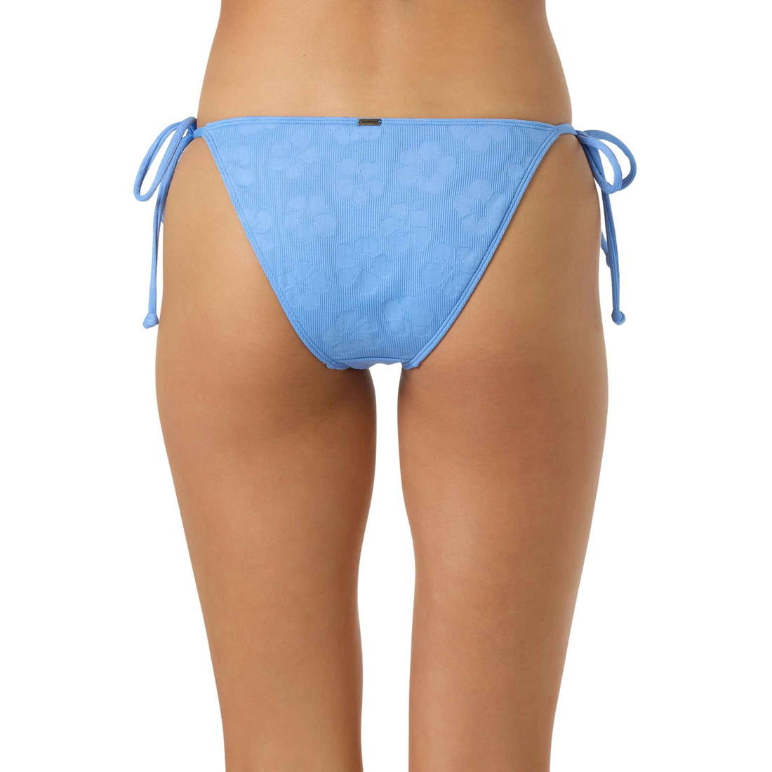 A light blue string bikini bottom with a subtle tonal floral pattern, shown on a model from the back against a white background.