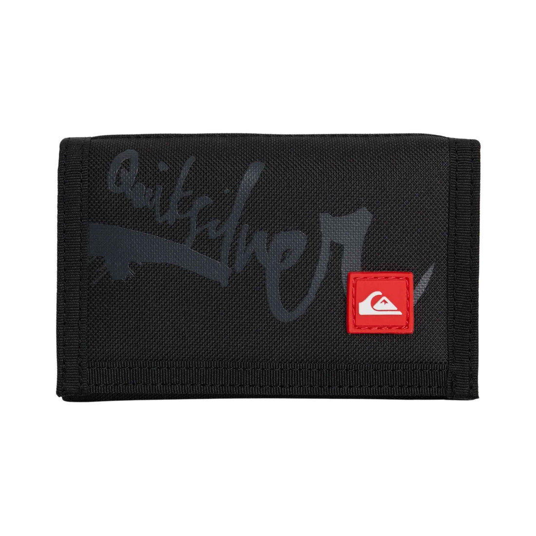 A black Quiksilver bi-fold wallet made of textured canvas, featuring a dark gray tonal logo on the front and a small red square patch with the white Quiksilver wave logo on the right side.