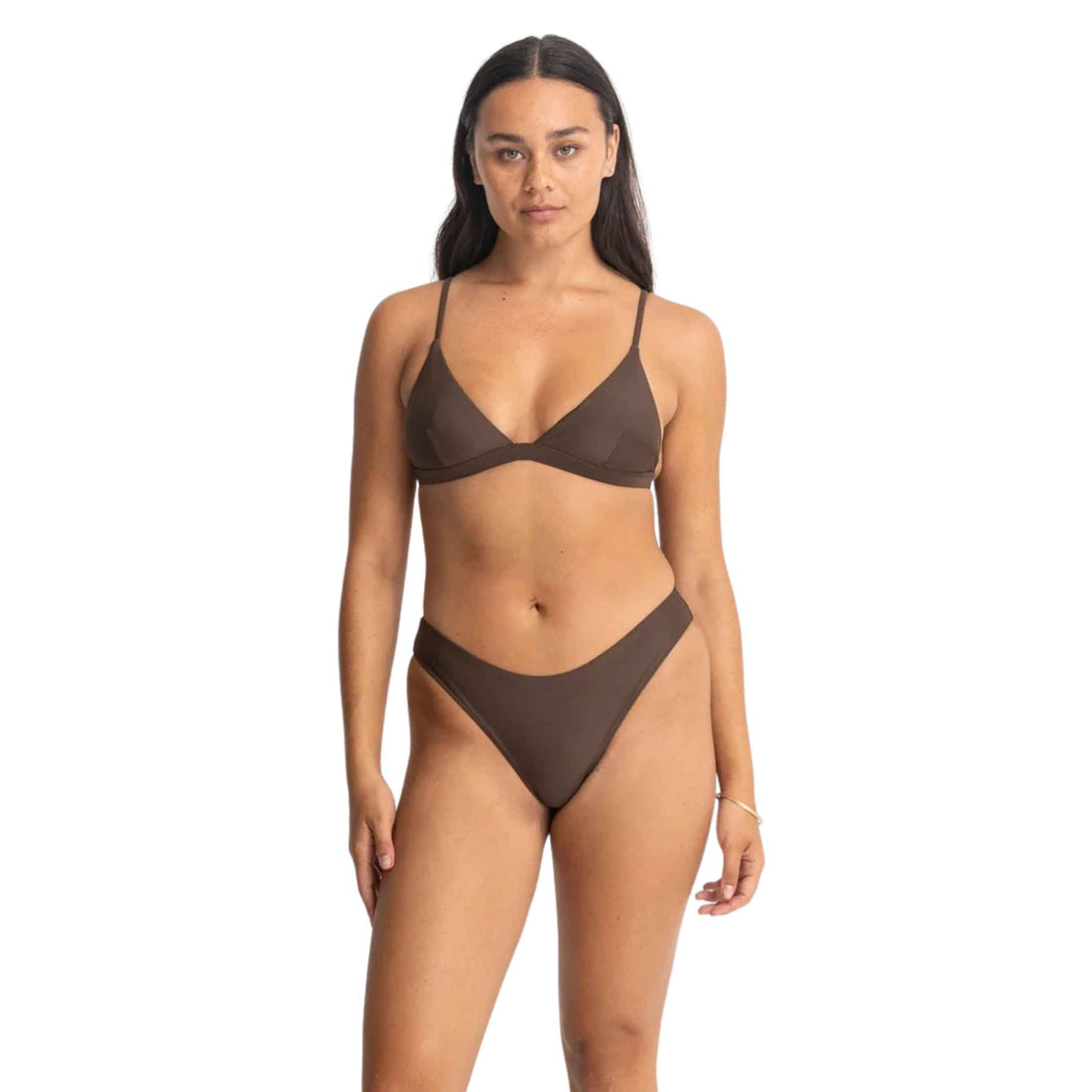 A woman modeling a two-piece bikini set in a solid dark brown color, featuring a triangle halter top and matching high-cut bottoms, against a plain white background.