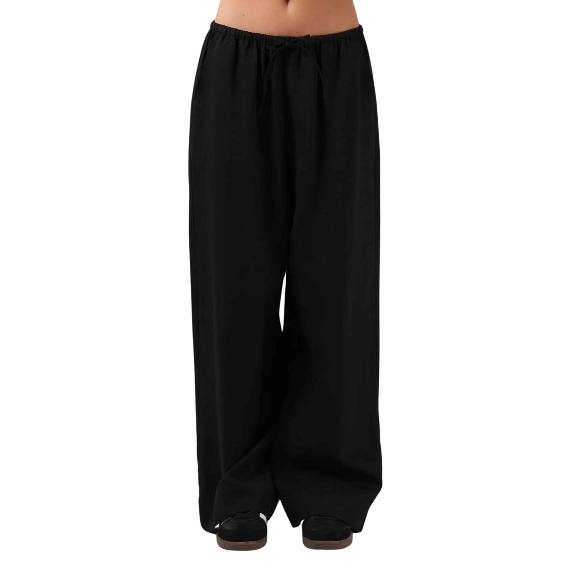 RPM Women's Norma Pant in Black with a relaxed wide-leg fit, full-length leg and elasticated drawcord waistband.