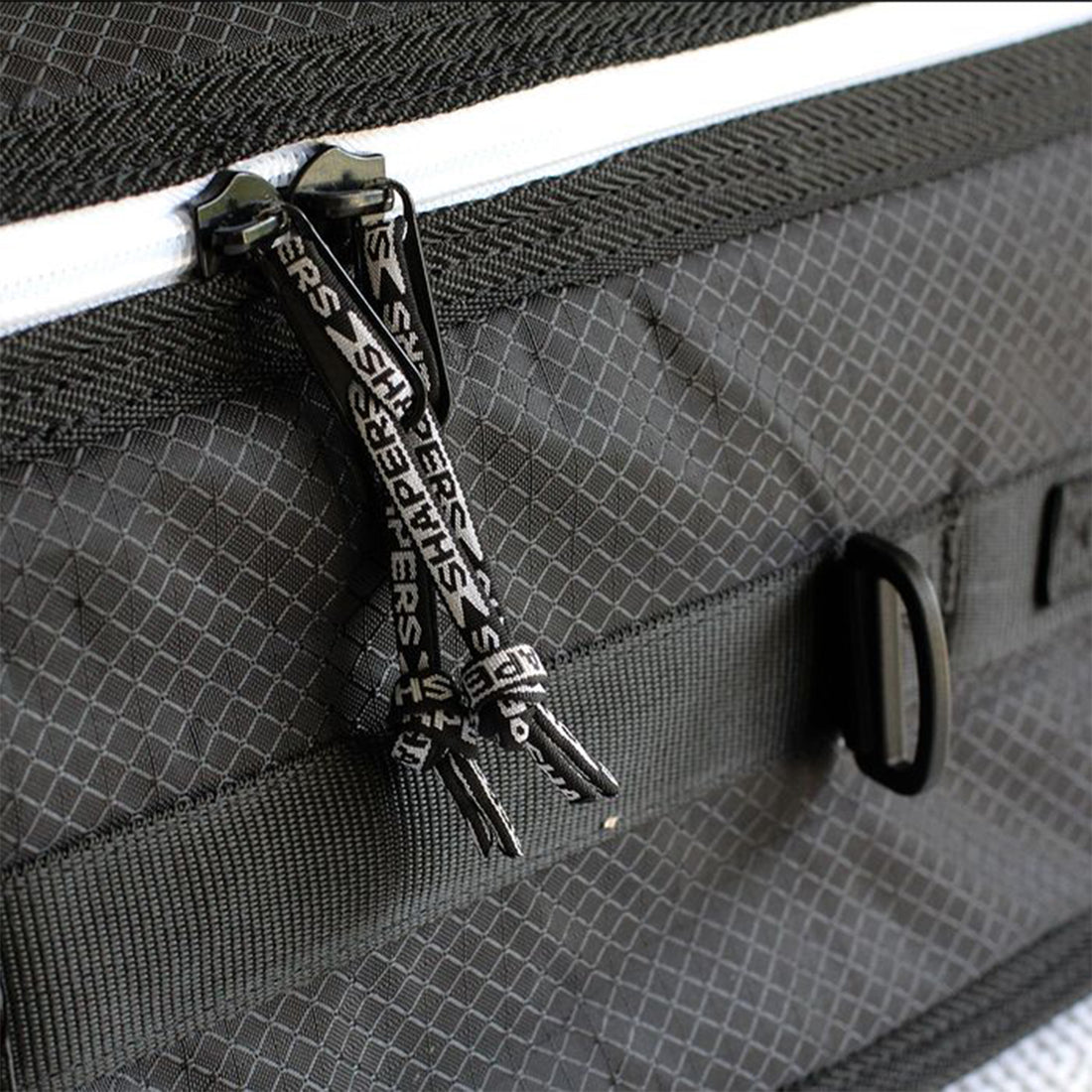 Shapers Global Wheely Surfboard Travel Bag — wheeled multi-board surf travel coffin with heavy padding and internal tie-downs, available at Freeride Surf & Skate NZ.