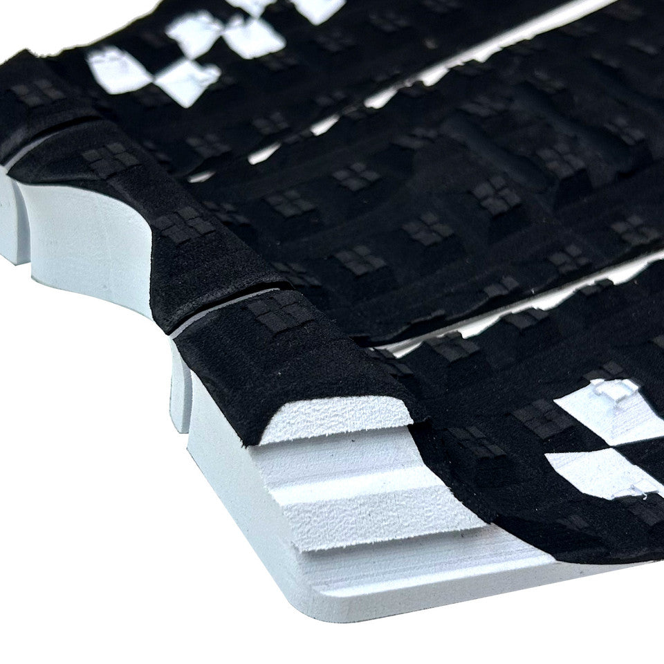 Shapers Sheldon Simkus Pro Model 3 piece surfboard tail pad black white traction pad available at Freeride Surf & Skate NZ.