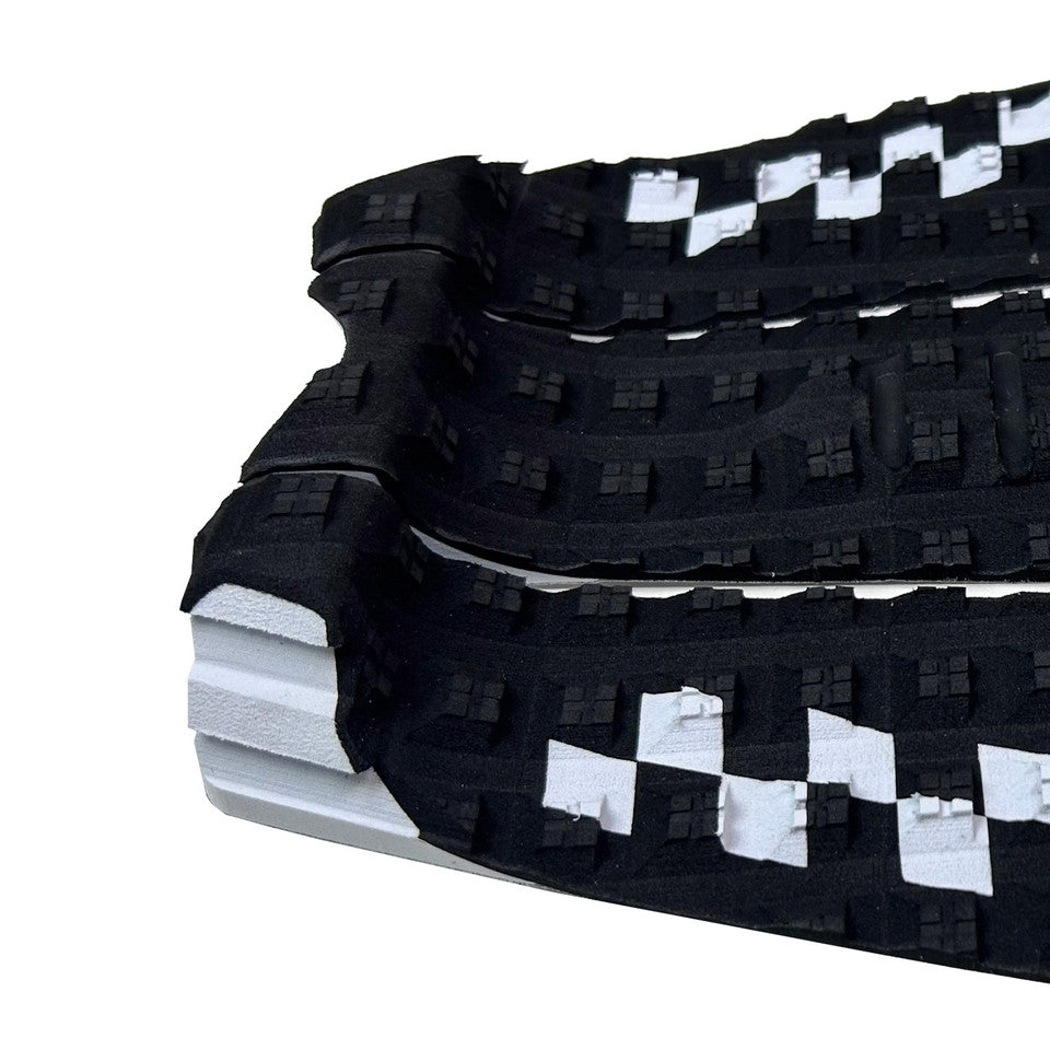 Shapers Sheldon Simkus Pro Model 3 piece surfboard tail pad black white traction pad available at Freeride Surf & Skate NZ.