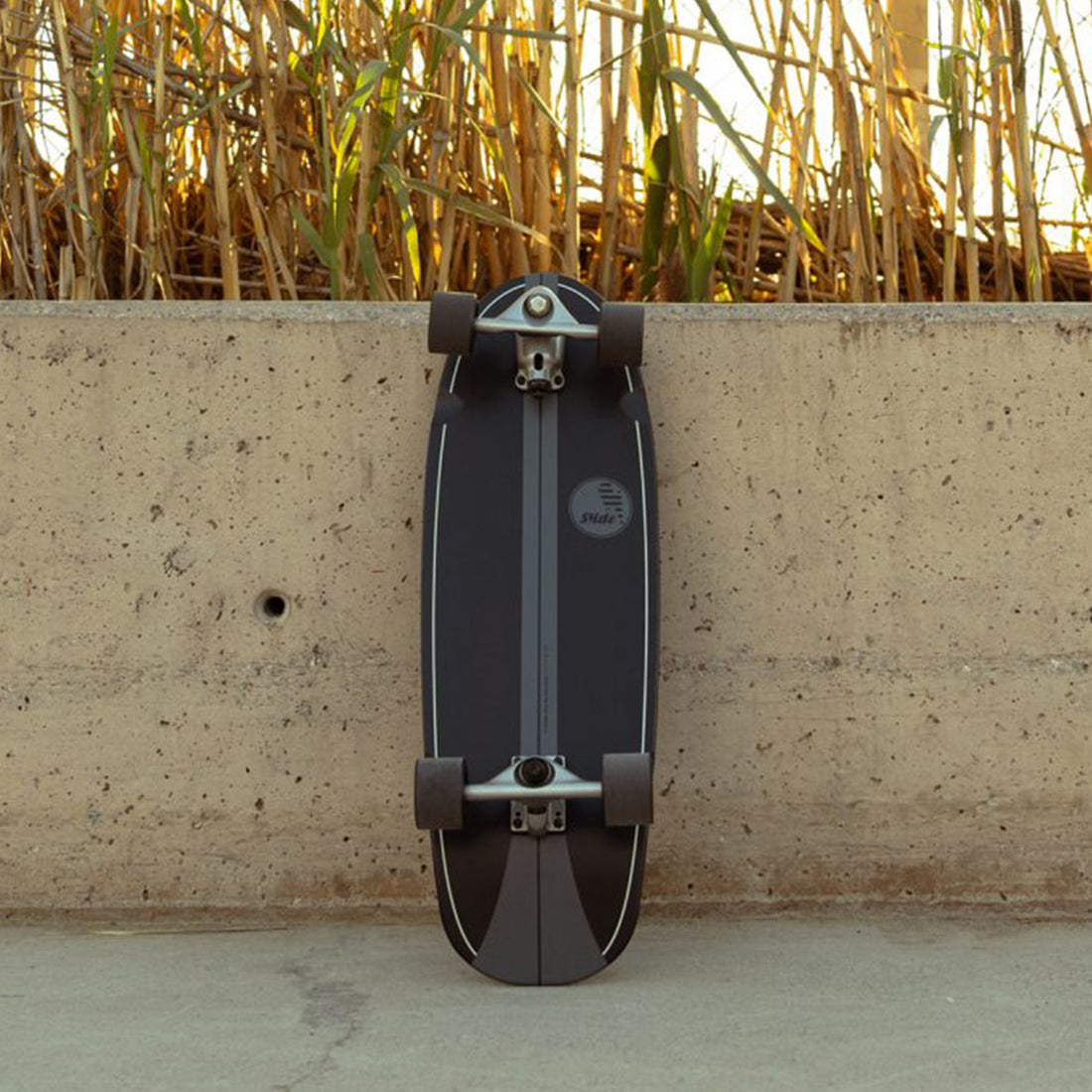 Slide Gussie Onyx 31 Inch Surf Skate designed for carving, bowl riding and cruising.