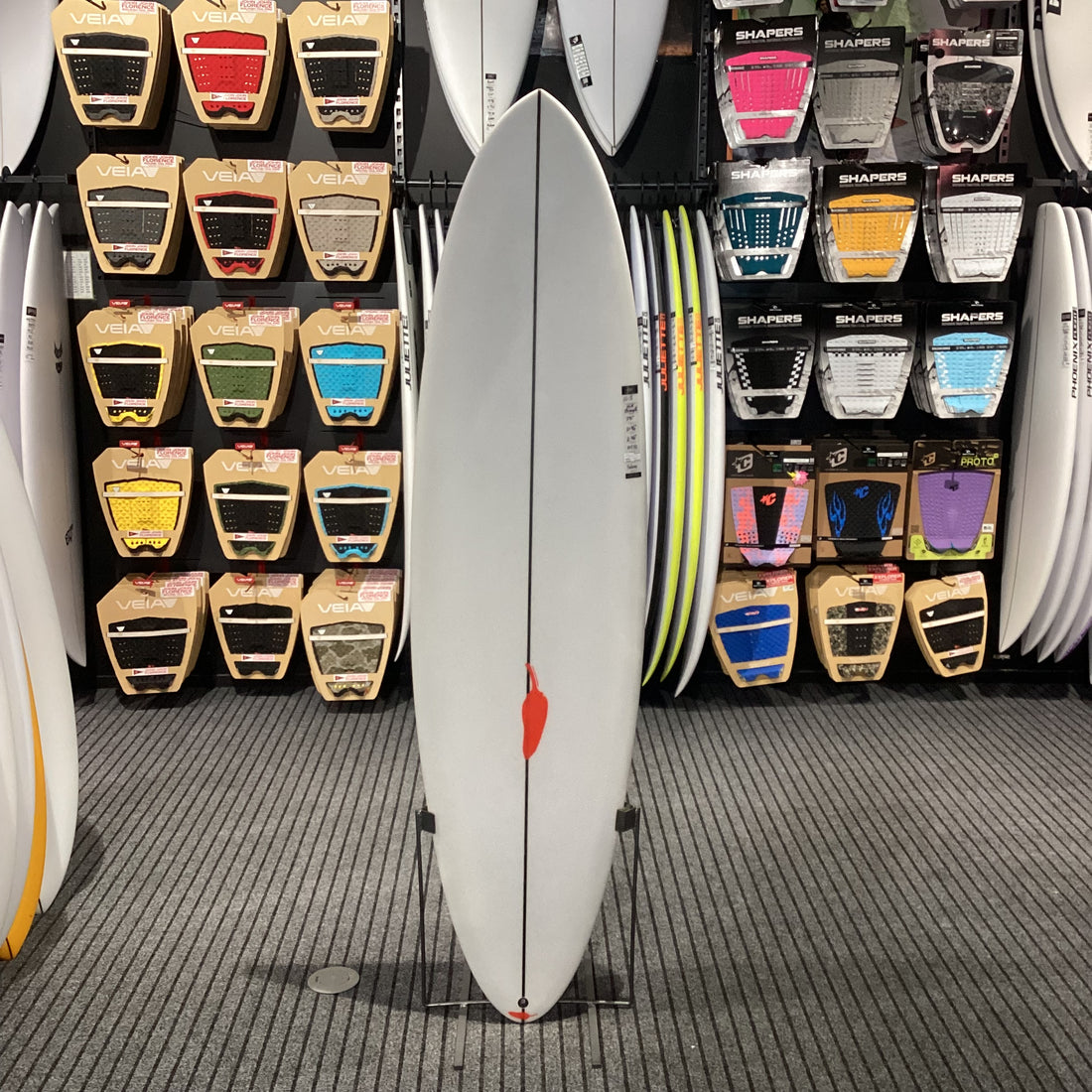 Near-new Chilli Mid Strength surfboard 7'0 with Futures fin setup and 45.5L volume available at Freeride Surf & Skate NZ.