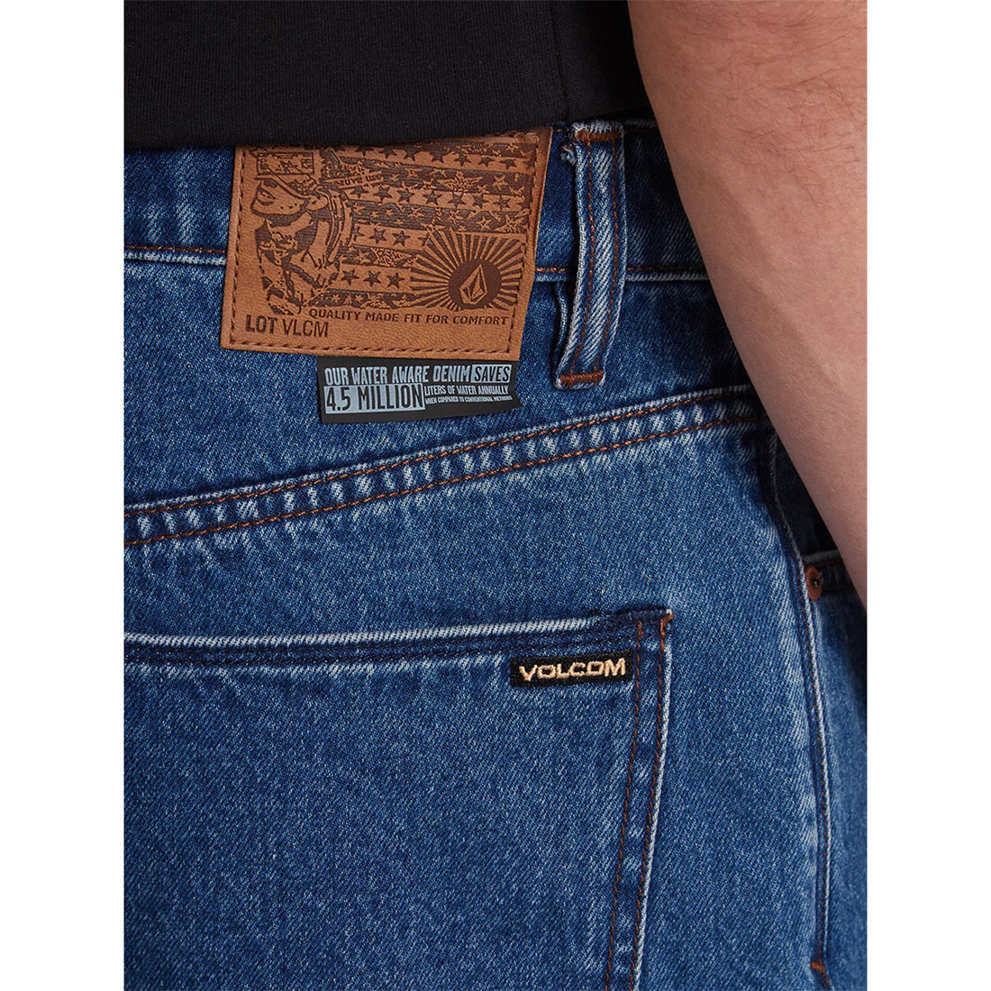 Volcom Billow Denim Short in Oliver Mid Blue with relaxed fit, five-pocket construction and medium-wash denim finish.