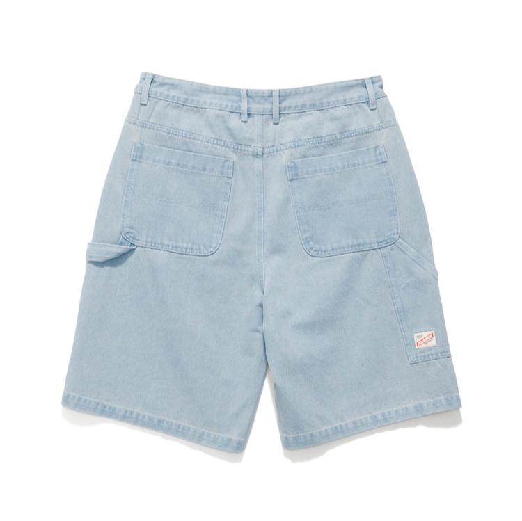 XLARGE Denim Work Short in washed Mid Blue with baggy wide-leg fit, knee panels and workwear tool pocket.
