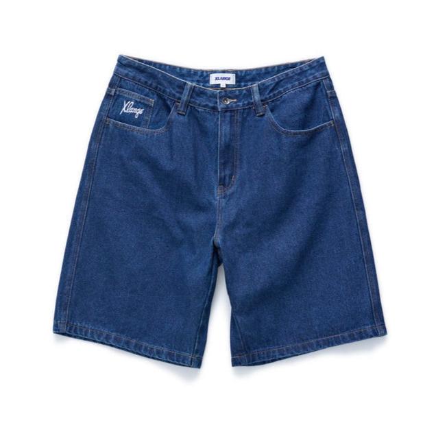 XLARGE Dice Bull Denim Short in Raw Indigo with extra-wide leg, loose 91 fit and embroidered back pocket graphic.