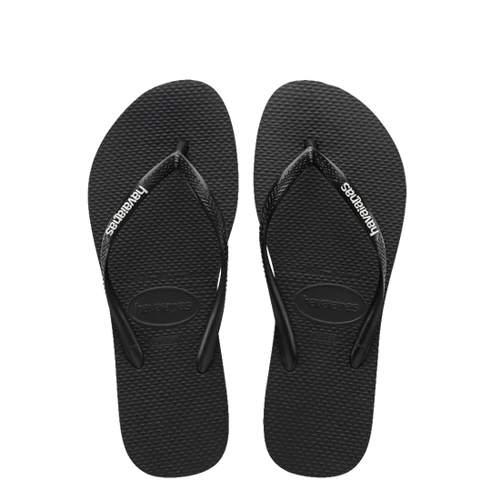 Havaianas Slim Logo Pop Up Black White Jandals — black Brazilian sandals with slim strap and raised white logo, available at Freeride Surf & Skate NZ