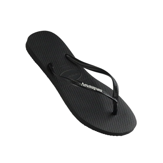 Havaianas Slim Logo Pop Up Black White Jandals — black Brazilian sandals with slim strap and raised white logo, available at Freeride Surf & Skate NZ